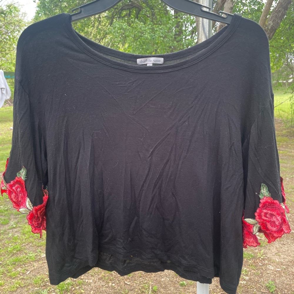 Charlotte Russ Black Top with Red Floral Accents
